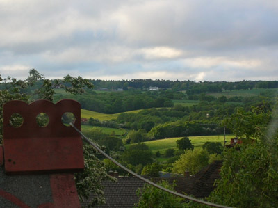 Over the roof of my studio you can see the fields and woods undulating across the valley.
